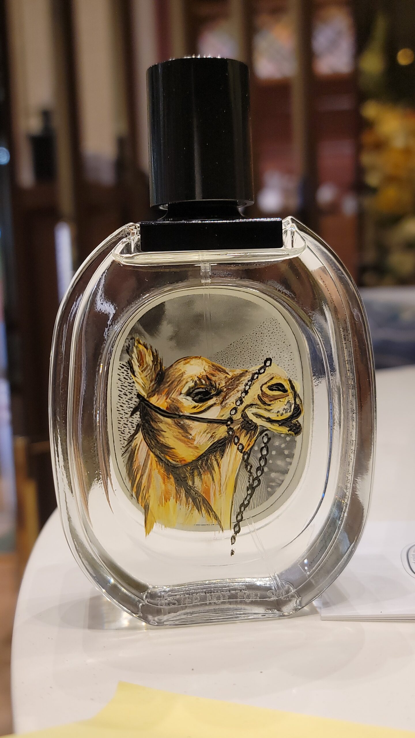 Artistic Arabic Animal on a premium fragrance bottle, highlighting detailed craftsmanship