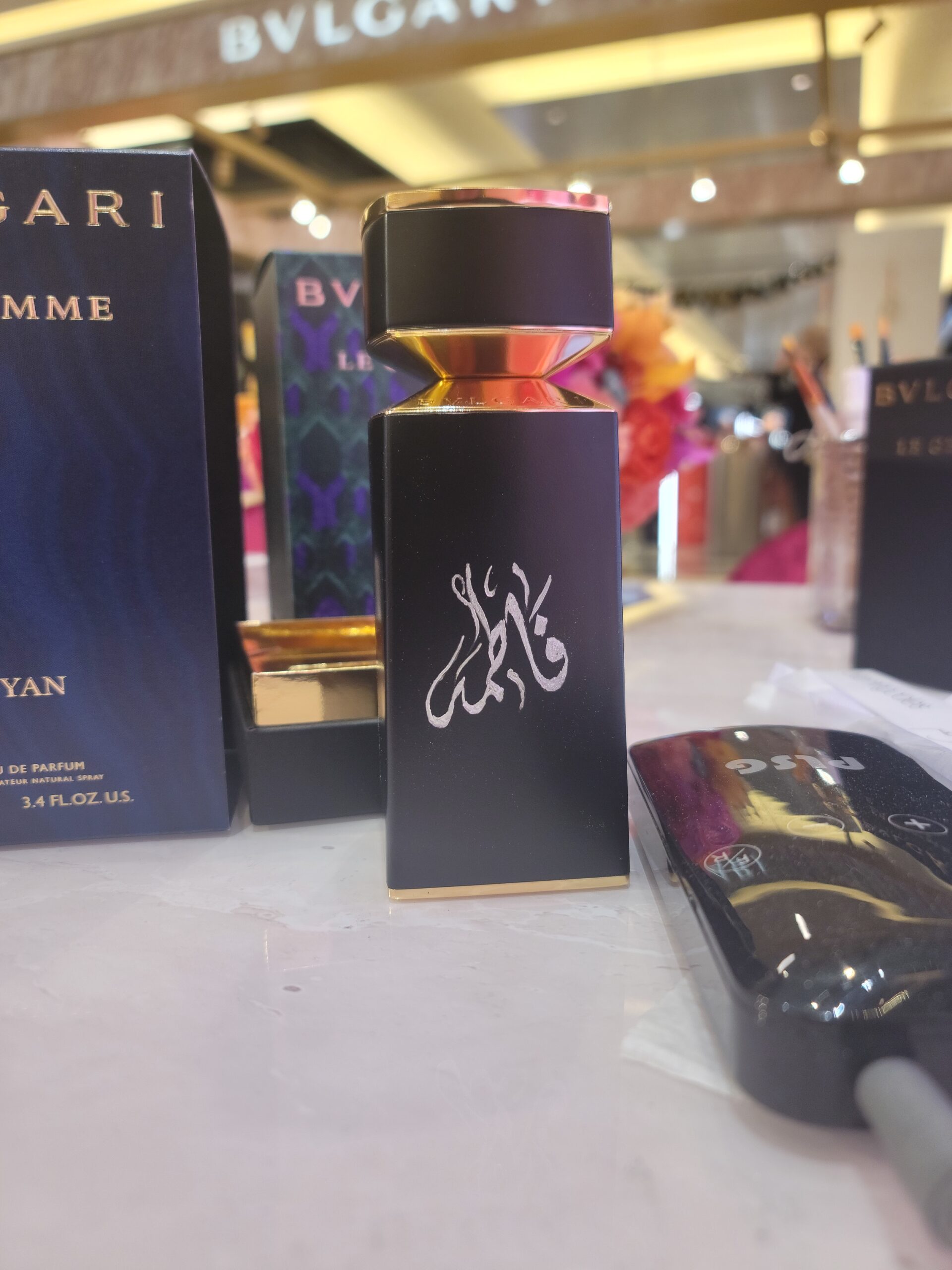 Personalized perfume bottle with Arabic calligraphy engraving, ideal for gifting and luxury collections.