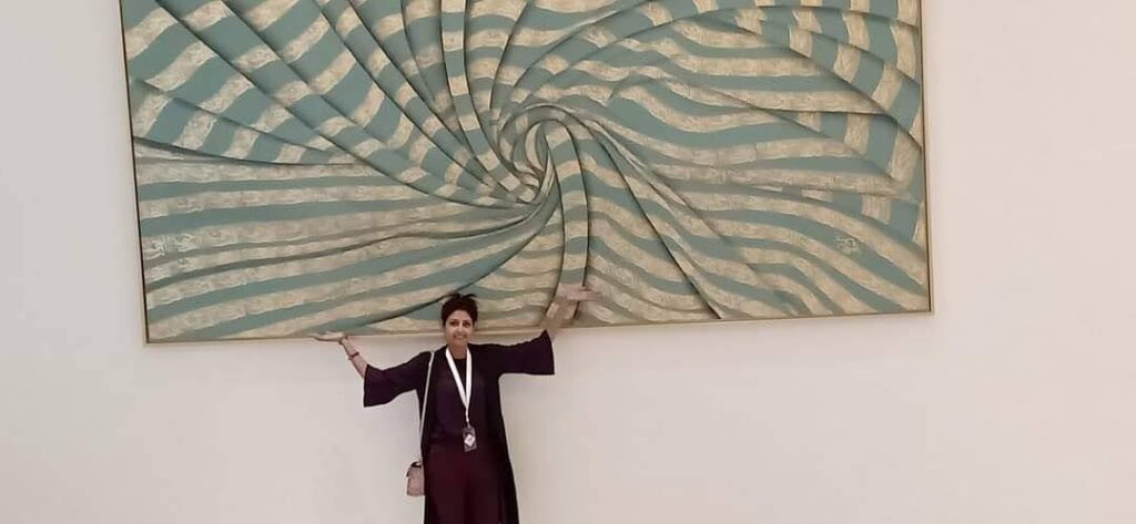 Massive modern calligraphy painting displayed at Galleria Mall Abu Dhabi, featuring abstract Arabic strokes and Dubai-inspired calligraphy by a Pakistani artist in UAE.